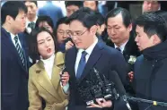  ?? YONHAP NEWS AGENCY VIA AFP ?? Samsung chief Lee Jae-yong arrives in court for a hearing to review the issuing of his arrest warrant in Seoul on Thursday.