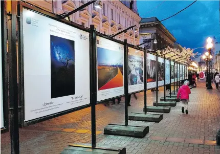  ??  ?? There’s so much art in Moscow it spills outside, such as this public art exhibition­s on Old Arbat Street.