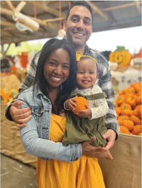  ?? HINDY GIRON VIA AP ?? Andy Giron with his wife, Alana Giron, and infant daughter in 2022 in Melville, New York. Giron met his wife on the dating app Hinge and married six months later.