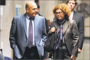  ?? Richard Drew / Associated Press ?? Pat Comunale, father of Joseph Comunale, and one of his attorneys, Elizabeth Kase, leave the courtroom last week.