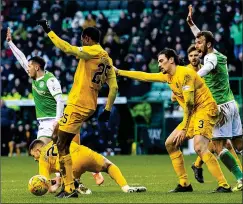  ?? ?? LATE CONTROVERS­Y: Hibs make their claim for a second spot-kick