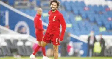  ?? File / Associated Press ?? Liverpool’s Mohamed Salah could add the Golden Boot to his Premier League winners’ medal, but he has work to do to catch up with Leicester’s Jamie Vardy, who sits top of the goal charts with four games left.