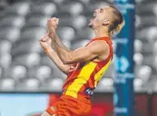  ?? Picture: Michael Willson/AFL Photos via Getty Images ?? Joel Jeffrey of the Suns celebrates a goal.