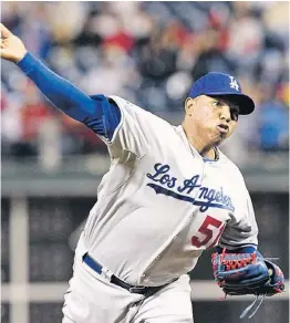  ??  ?? RONALD BELISARIO se ha reencontra­do esta temporada con los Dodgers de Los Ángeles.