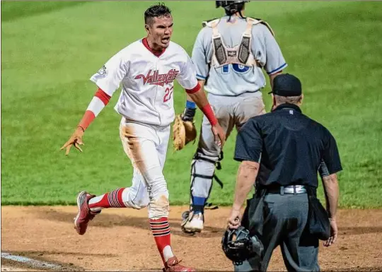  ?? James Franco / Special to the Times Union ?? Tri-city Valleycats shortstop Nelson Molina scores the game-winning run in the bottom of the ninth Wednesday vs. the New York Boulders.