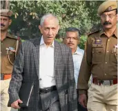  ??  ?? Dineshwar Sharma on his way for a meeting with various delegation­s in Jammu on Friday. — PTI