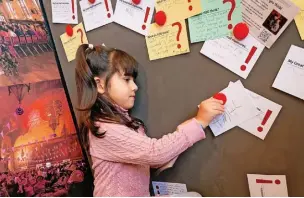  ?? ?? ●●A young visitor engaging with the displays