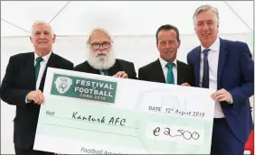  ??  ?? CEO of the FAI John Delaney presented a cheque for €2,500 to Kanturk AFC. Pictured with John is Club Chairman Micheal O’ Driscoll, Jimmy Moore, Schoolboys Secretary, and FAI President Tony Fitzgerald.