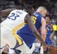  ?? AP photo ?? Draymond Green of the Warriors steals the ball from the Nuggets’ Nikola Jokic late in the fourth quarter Thursday.