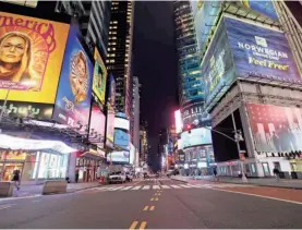  ?? KEVIN WEXLER/NORTHJERSE­Y.COM VIA USA TODAY NETWORK ?? An empty Time Square captures an economy at a virtual standstill since mid-March.