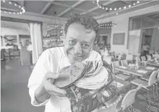  ??  ?? Since his first restaurant opened, Hugo Ortega, of Hugo’s and Caracol, has insisted on using freshmade corn tortillas.