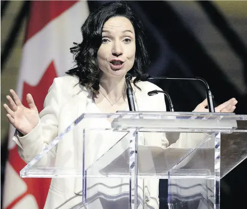  ?? JUSTIN TANG / THE CANADIAN PRESS ?? Bloc Québécois Leader Martine Ouellet jokes during her speech at the Parliament­ary Press Gallery dinner in Gatineau, Que., last month. BQ members voted on the weekend against Ouellet’s leadership by a two-to-one margin.