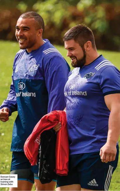 ??  ?? Duncan Casey arrives at training with Simon Zebo
