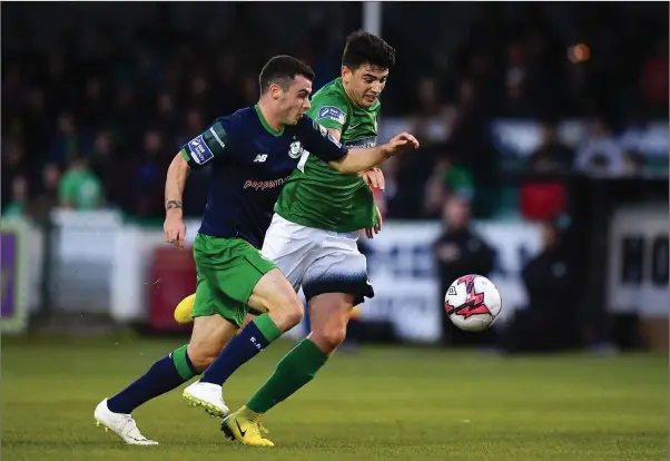  ??  ?? Joel Coustrain of Shamrock Rovers in action against Darragh Noone of Bray Wanderers.