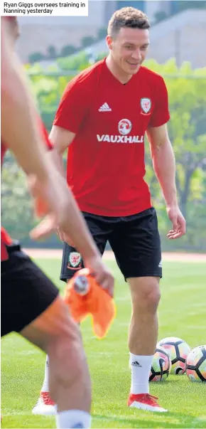  ??  ?? Ryan Giggs oversees training in Nanning yesterday