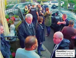  ??  ?? Shambles Dozens of cops turned up at the house in Cambuslang