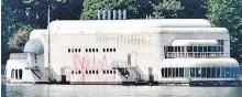  ??  ?? The floating McDonald’s restaurant, known as McBarge, sits graffitico­vered on Burrard Inlet in this 2011 photo.