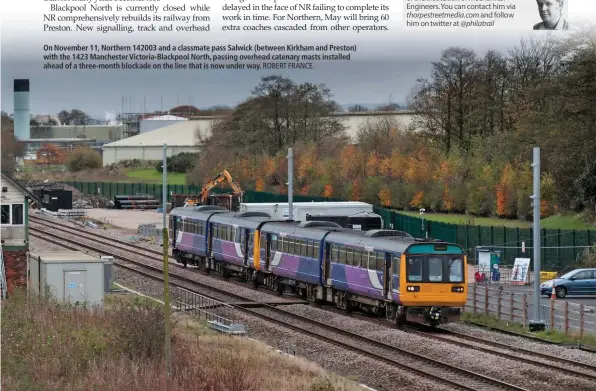  ?? ROBERT FRANCE. ?? On November 11, Northern 142003 and a classmate pass Salwick (between Kirkham and Preston) with the 1423 Manchester Victoria-Blackpool North, passing overhead catenary masts installed ahead of a three-month blockade on the line that is now under way.