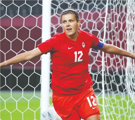 ?? KIM HONG-JI/REUTERS ?? Christine Sinclair celebrates scoring Team Canada's first — and only — goal against Japan, after tapping in her own rebound.