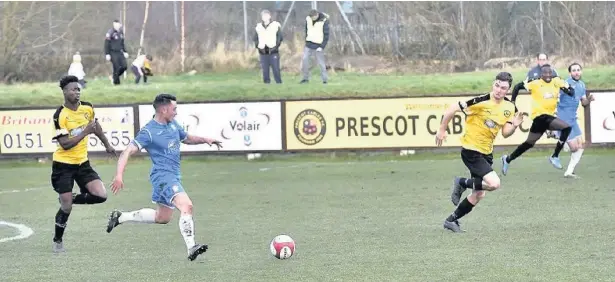  ?? Frank Crook ?? Phil Dean races at the Prescot defence during Ramsbottom’s 2-1 defeat at the weekend