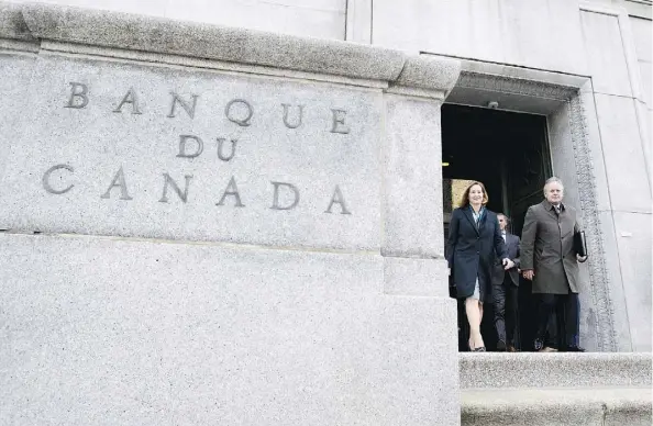  ?? SEAN KILPATRICK/THE CANADIAN PRESS ?? Bank of Canada’s senior deputy governor Carolyn Wilkins and governor Stephen Poloz, pictured, are facing a test of credibilit­y with the central bankers’ shift to normalcy after a decade of extraordin­ary displays of financial alchemy, writes Kevin Carmichael,