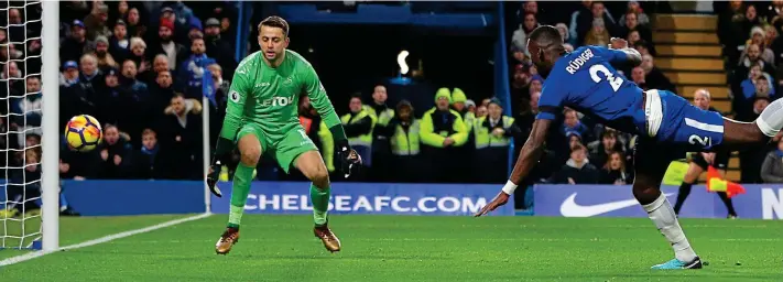  ?? REUTERS ?? Head boy: Chelsea centre half Antonio Rudiger scores the only goal at Stamford Bridge, stooping to head past a static Lukasz Fabianski in the Swansea goal