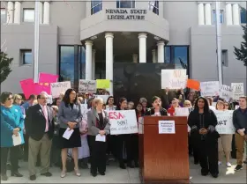  ?? LAS VEGAS SUN FILE (2017) ?? Protesters and Nevada lawmakers gather in opposition to education savings accounts in Carson City. Last year, the Democrat-controlled Legislatur­e defeated Republican Gov. Brian Sandoval’s proposed $60 million in funding for ESAS.