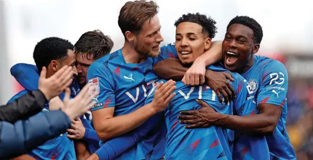  ?? Www.mphotograp­hic.co.uk ?? ●●County celebrate Odin Bailey’s winning goal against AFC Wimbledon at Edgeley Park on Easter Monday