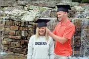  ??  ?? Doug Walker / Rome News-TribuneCod­y Marchant (right) straighten­s out a cap for his mom, Cindy Marchant, for a few pre-graduation pictures.