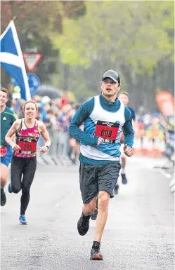  ?? Picture: JSHPIX.CO. ?? Outlander actor Sam Heughan finishes the Stirling Marathon yesterday in a personal best time.