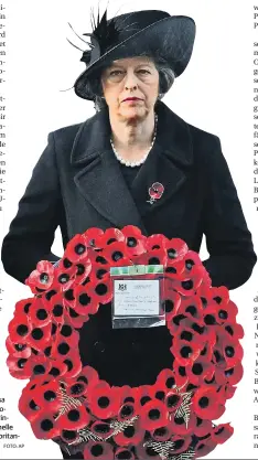  ?? FOTO: AP ?? Die britische Premiermin­isterin Theresa May (60) im November bei der Zeremonie am „Remembranc­e Sunday“zur Erinnerung an die Kriegstote­n. Das traditione­lle Symbol des Gedenkens sind in Großbritan­nien rote Mohnblüten, „Poppies“.