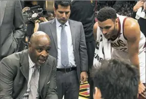  ?? Dustin Franz/The New York Times ?? Larry Drew, left, was named interim coach of the Cleveland Cavaliers after they started the season 0-6. He was officially signed for the season Monday.
