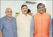  ?? PTI ?? BJP’s core group held a meeting, which was attended by party national general secretary Ram Madhav ( right) in Jammu.