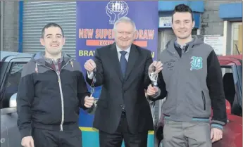  ??  ?? Jordan Forde and Dean Cox are lucky December winners of the Bray Dredit Union monthly car draw, with Michael Doyle of Michael Doyle cars.