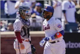  ?? JOHN MINCHILLO – THE ASSOCIATED PRESS ?? Robinson Cano, right, who was designated for assignment and ultimately released by the Mets on Sunday, was batting just .195with one homer in 43plate appearance­s this season.