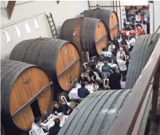  ?? BORIS HORVAT, AFP/GETTY IMAGES ?? The World Blind Wine Tasting drew 80 participan­ts representi­ng 20 countries to Chateauneu­f-du-Pape, in October 2015.