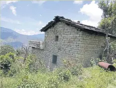  ??  ?? The village of Bastadi in Uttarakhan­d was declared uninhabita­ble and uncultivab­le after flash floods in July 2016. But one person still lives there.