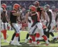  ?? MARK LOMOGLIO — THE ASSOCIATED PRESS ?? Nick Chubb celebrates with Baker Mayfield after scoring on a 1-yard touchdown run against the Buccaneers on Oct. 21 in Tampa, Fla.