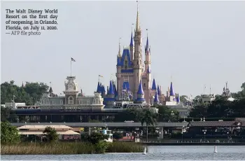  ?? — AFP file photo ?? The Walt Disney World Resort on the first day of reopening, in Orlando, Florida, on July 11, 2020.