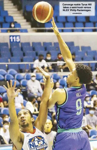  ?? ?? JUN MENDOZA Converge rookie Tyrus Hill takes a semi-hook versus NLEX’ Philip Paniamogan.