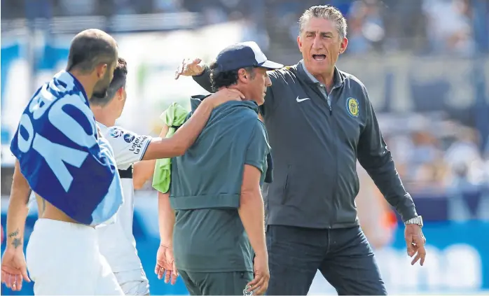  ?? Gentileza diario el día ?? Pedro Troglio, DT de Gimnasia LP, y Edgardo Bauza, técnico de Rosario Central, lucharán el jueves próximo por un viejo anhelo de ambos clubes: ser campeón