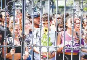  ?? AFP ?? People protest against the Brazilian Federal Government on Monday, a day after a massive fire ripped through Rio de Janeiro’s National Museum.