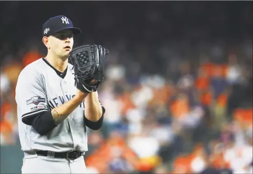  ?? Mike Ehrmann / Getty Images ?? Yankees pitcher James Paxton stands on the mound during Game 2 of the ALCS at Houston.