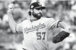  ?? BILL KOSTROUN/AP ?? The Washington Nationals traded Tanner Roark to the Reds for another right-hander named Tanner, less proven Tanner Rainey.