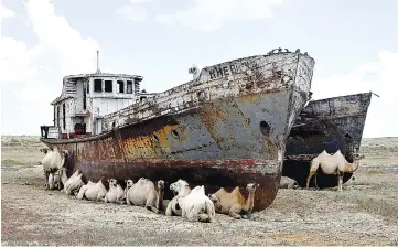  ?? — UN Photo/Eskinder Debebe ?? Rusted, abandoned ships in Muynak, Uzebkistan, a former port city whose population has declined precipitou­sly with the rapid recession of the Aral Sea.