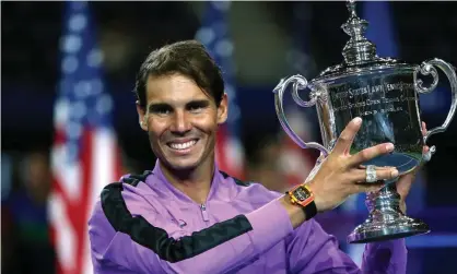  ?? Photograph: Matthew Stockman/Getty Images ?? Rafael Nadal celebrates with the championsh­ip trophy after winning the 2019 US Open.