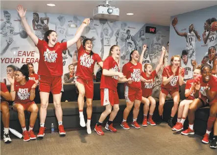  ?? Tony Avelar / Special to The Chronicle ?? Above, the Stanford women cheer as they learn of their selection to the NCAA Tournament on Monday. The Cardinal, a fourth seed, will host the first two rounds, including an opening-round matchup with 13-seed Gonzaga.