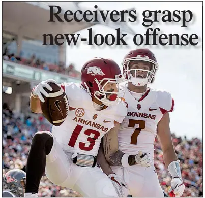  ?? NWA Democrat-Gazette/BEN GOFF ?? Junior Deon Stewart (left) and senior Jonathan Nance, who combined for 943 yards through the air last season, are among those who started last year and return to the wide receiver unit for the Razorbacks.