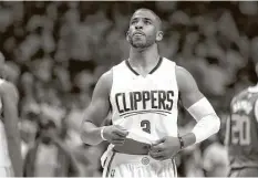  ?? Sean M. Haffey / Getty Images ?? Despite saying for six years he was happy to be a member of the Los Angeles Clippers, Chris Paul seemed pretty eager to change jerseys when he had the opportunit­y.