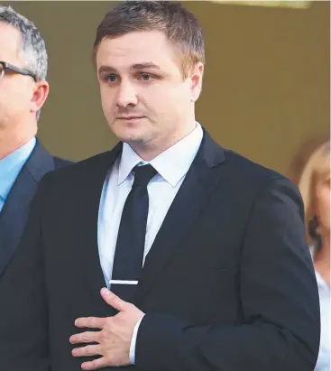  ?? Picture: AAP/DAN PELED ?? ACCUSED: Police officer Kurt Nesterowic­h leaves Brisbane District Court yesterday.